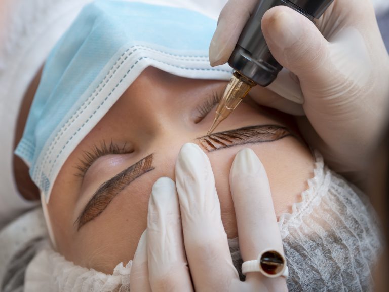 female-client-going-through-microblading-treatment