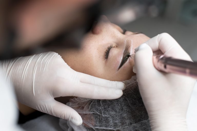 young-woman-going-through-microblading-treatment