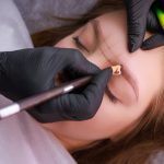 Permanent eyebrow makeup PMU procedure