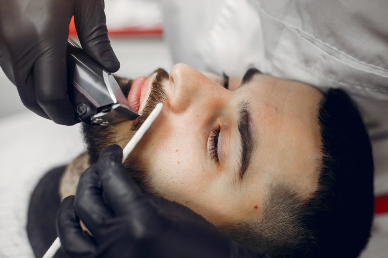 Stylish man sitting in a barbershop