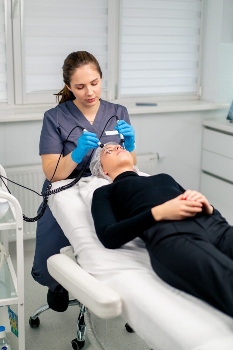 imgi_41_beautician-doctor-massaging-the-skin-of-a-client-s-face-during-beauty-and-health-cosmetic-procedure-e1744882557568